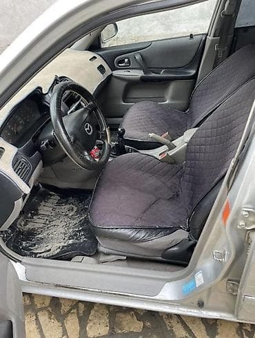 jac js6: Mazda 323: 2003 г., 1.4 л, Механика, Бензин, Седан — 5