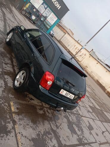 купить держатель номера на авто: Mazda 323: 2003 г., 1.6 л, Механика, Бензин, Хэтчбэк — 5