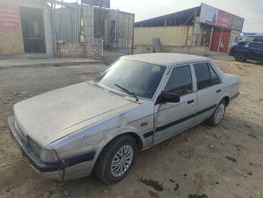 аккумулятор мотоцикла: Mazda 626: 1983 г., 2 л, Механика, Бензин, Седан — 9