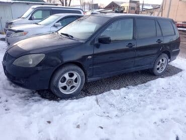 Продажа авто: Mitsubishi Lancer: 2003 г., 2 л, Механика, Бензин, Универсал — 6