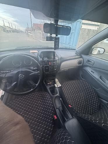 terrano 2: Nissan Almera: 2003 г., 1.8 л, Механика, Бензин, Хэтчбэк — 6