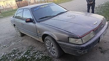 кызыл октябрь: Mazda 626: 1990 г., Кол менен иштөөчү, Седан — 2