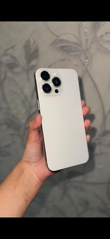 apple vision pro: IPhone 15 Pro, Natural Titanium — 1