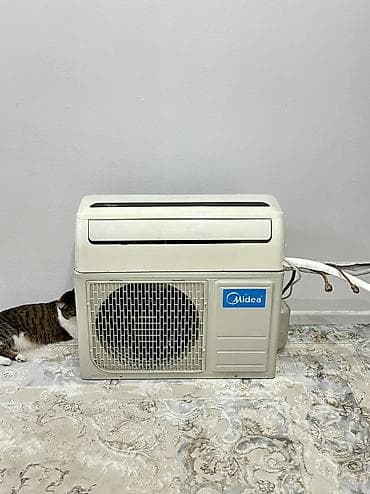 Сплит-система, Midea, Б/у, 30-35 м², Классический — 1