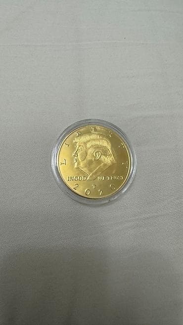 Монета 45-й президент США
Дональд Трамп