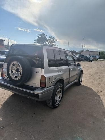 выбор номера о: Suzuki Escudo: 1996 г., 2.5 л, Бензин, Внедорожник — 3