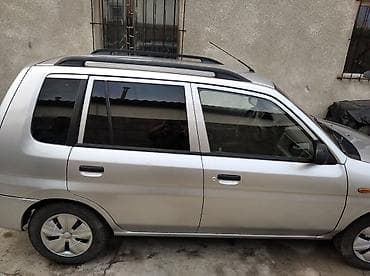 Продажа авто: Mazda Demio: 2000 г., 1.3 л, Механика, Бензин, Хэтчбэк — 4