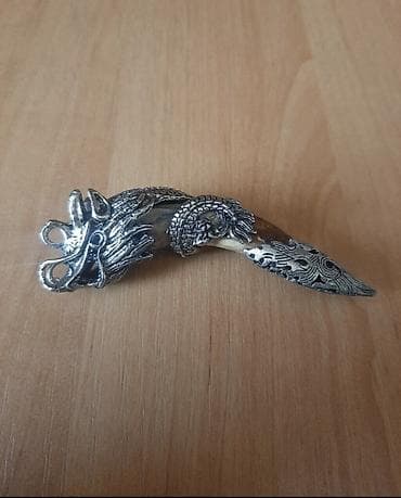 Серебряная подвеска, виде дракона. Ручная работа. (Внутри клык кабана)