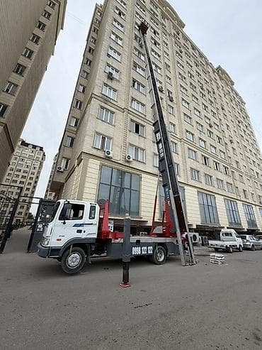 строительное бригада: Стрела 65 м, 250 т — 2