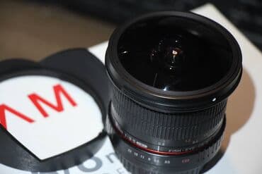 коника минолта: Продам объектив SAMYANG 3.5/8mm. Состояние нового, коробка, документы — 1