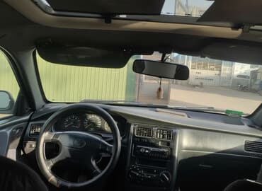 Toyota Carina E: 1994 г., 1.8 л, Механика, Бензин, Хэтчбэк