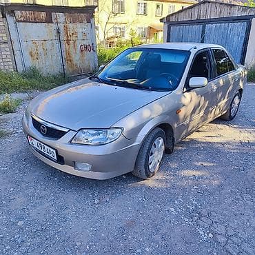 бутка бу: Mazda Familia: 2002 г., 1.6 л, Автомат, Бензин, Седан — 3