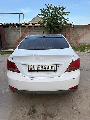 2 8: Hyundai Solaris: 2015 г., 1.4 л, Автомат, Бензин, Седан — 4
