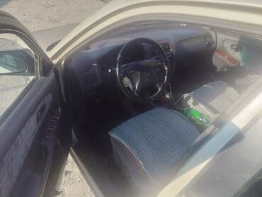 обмен машинами с доплатой: Mazda 626: 1999 г., 2 л, Механика, Бензин, Хэтчбэк — 4