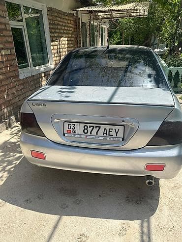 сузики лиано: Mitsubishi Lancer: 2003 г., 1.3 л, Механика, Бензин, Седан — 4