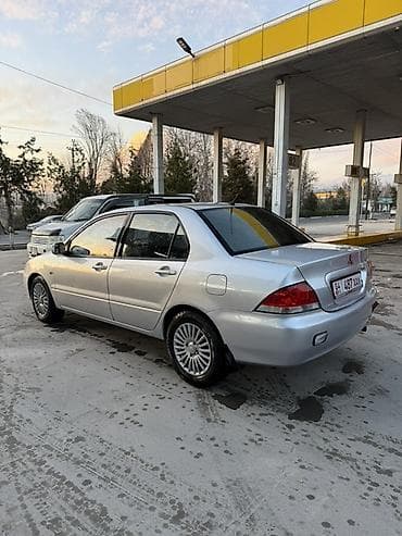 лада веста крос: Mitsubishi Lancer: 2004 г., 2 л, Автомат, Бензин, Седан — 1