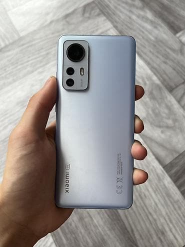а 10 с: Xiaomi, 12, Б/у, 256 ГБ, цвет - Голубой, 2 SIM — 1