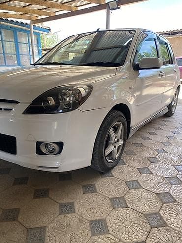 гитара мазда: Mazda Demio: 2004 г., 1.5 л, Механика, Бензин, Хэтчбэк — 4