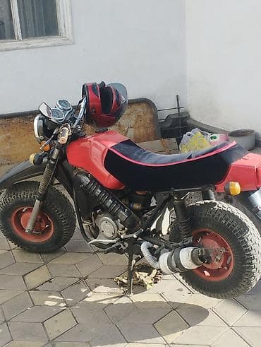 детский мопед на бензине: Мини-мотоцикл с широкими внедорожными шинами Описание: - Компактный — 3