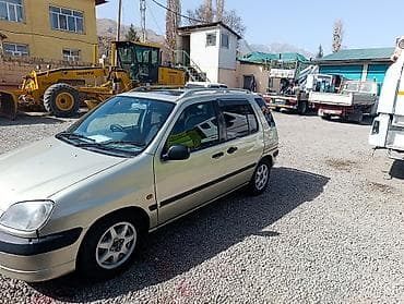 расурочка машина: Toyota Raum: 1998 г., 1.5 л, Автомат, Бензин, Минивэн — 5