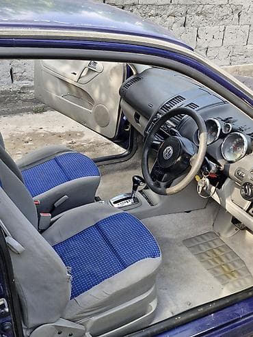 гольфы выше колена: Volkswagen Polo: 2000 г., 1.4 л, Автомат, Бензин, Хэтчбэк — 5