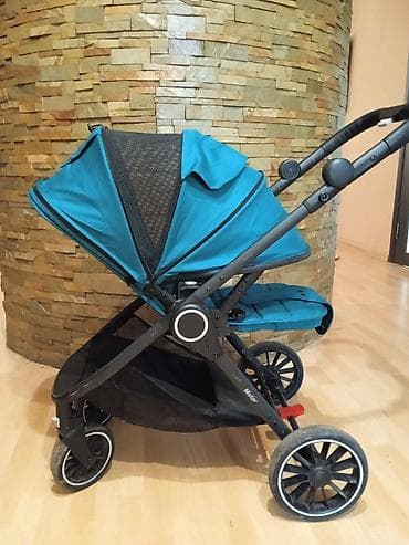 коляска уоуо: Универсальная детская коляска 2-в-1, цвет бирюзовый. Особенности: - — 4