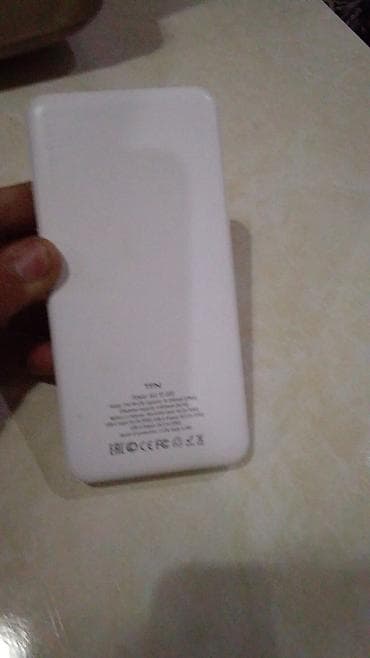 Портативный аккумулятор (power bank) белого цвета. Характеристики и