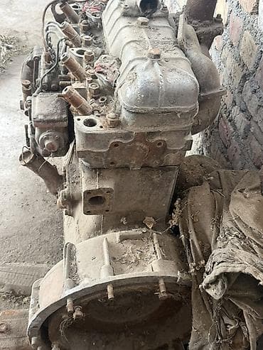 Двигатель СМД-14 
Работал . Приехали на нем и сняли — 1