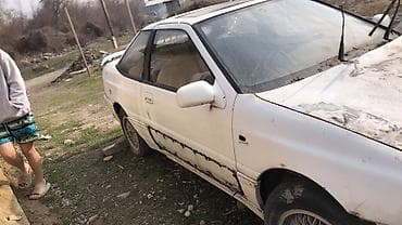 пинин ио: Купе белого цвета конца 80‑х – начала 90‑х годов с характерным задним — 3