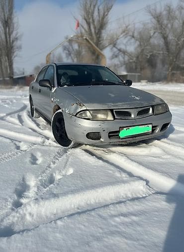 б1: Mitsubishi Carisma: 1997 г., 1.6 л, Механика, Бензин, Хэтчбэк — 1