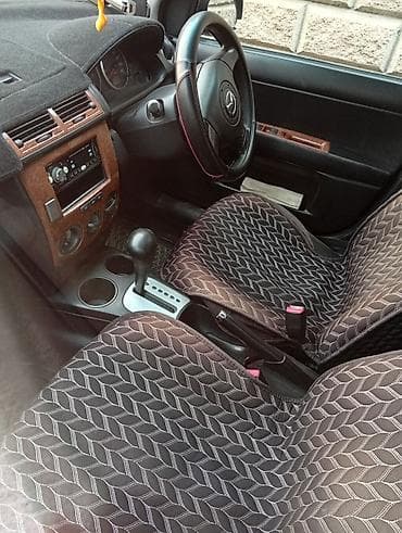 step wgn: Mazda Demio: 2005 г., 1.3 л, Автомат, Бензин, Хэтчбэк — 7