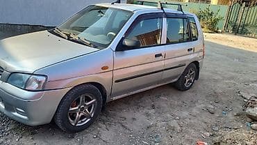 Унаа: Mazda Demio: 2002 г., 1.3 л, Кол менен иштөөчү, Бензин, Хетчбек — 2