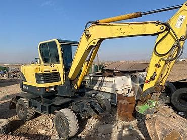 автомобильный пылесос: Экскаватор, 2010 г., Колесный — 8