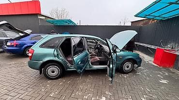 некая 3: Mazda Familia: 2003 г., 1.6 л, Автомат, Бензин, Универсал — 5