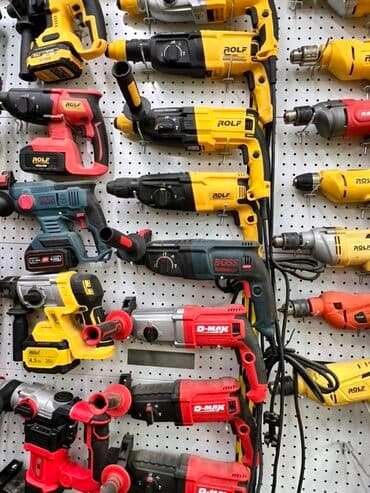 Клеевые пистолеты: Электроинструменты для строительства и ремонта Ассортимент на стенде — 2