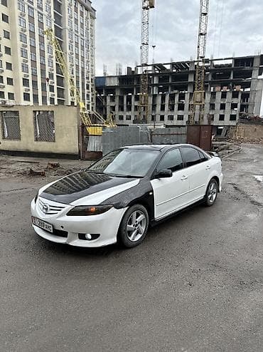 выхлопная трасса: Mazda Atenza: 2003 г., 2.3 л, Типтроник, Бензин, Лифтбек — 3