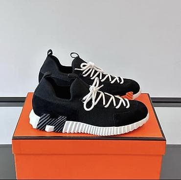 Прокат одежды: Кроссовки с выраженной подошвой и контрастной отделкой - Дизайн — 3