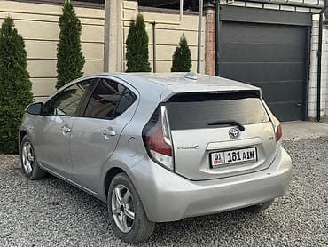 тойота приус с: Toyota Prius C: 2015 г., 1.5 л, Автомат, Гибрид, Лифтбек — 4