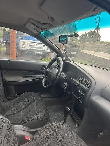 електро машина: Mazda 323: 1995 г., Седан — 6