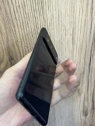 Apple iPhone: Google Pixel 7a, Б/у, 128 ГБ, цвет - Черный, 1 SIM — 3