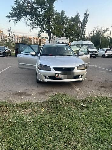 Mazda 323: 1998 г., 1.6 л, Механика, Бензин, Седан