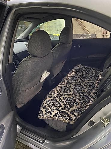 зеркло: Nissan Primera: 2002 г., 2 л, Механика, Бензин, Лифтбек — 10