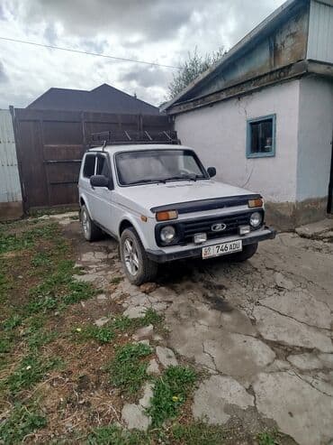 аккумулятор бишкек с доставкой: ВАЗ 2121 «Нива» 3‑дверная, белый цвет. Особенности и комплектация: - — 1