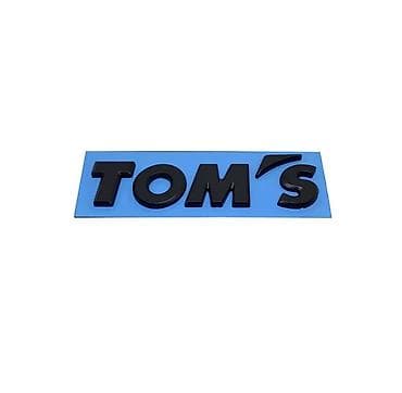Унаа: Шильдик TOM’S 
Шильдик тюнинг ателье томс тойота 
Toms toyota racing — 2