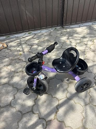 Детский трехколесный велосипед (трёхколёсник) фиолетового цвета