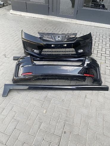 Тюнинг: Комплект обвеса Honda FIT GE9(седан) RS, черный глянец. В составе: - — 5