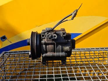 промышленные компрессор: Компрессор Mazda 1994 г., Б/у, Оригинал, Германия — 1