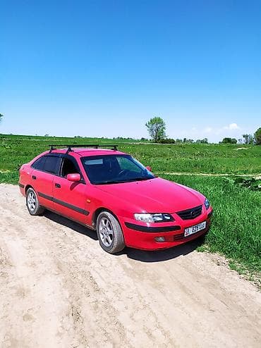демио 2005: Mazda 626: 2000 г., 2 л, Ручные, Бензин, Хэтчбэк — 9