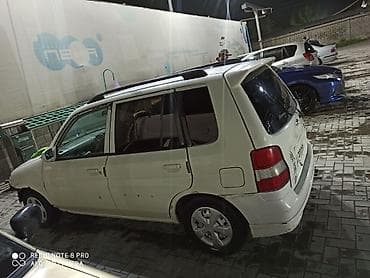 тачки б у: Mazda Demio: 1999 г., 1.4 л, Автомат, Бензин, Минивэн — 1