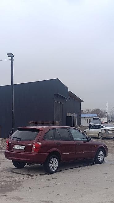 matiz 2009: Mazda 323: 2003 г., 1.3 л, Механика, Бензин, Хэтчбэк — 4